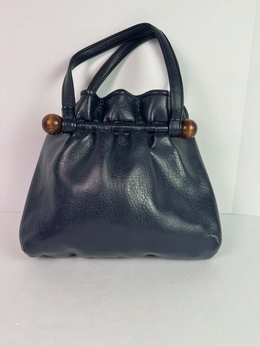 Vintage Navy Blue Leather Kiss Lock Handbag with Wood Accents